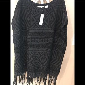 Woman’s black patterned poncho sz M new with tags